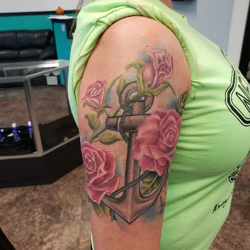 Blue Lotus Piercing and Tattoo